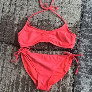 Bright pink swimming suit